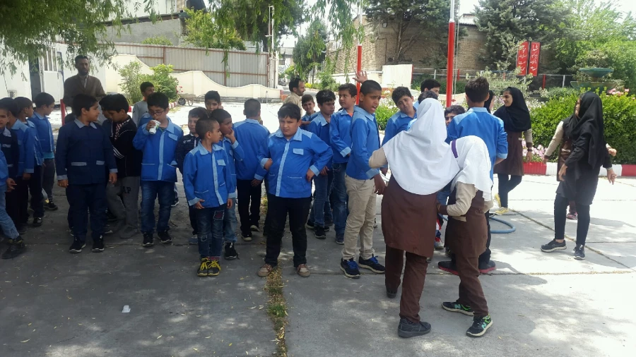 حضور مسئولین، معلمان و دانش آموزان مدرسه همکار شهید مرادی در پردیس و برگزاری مراسم تقدیر از معلمان 9